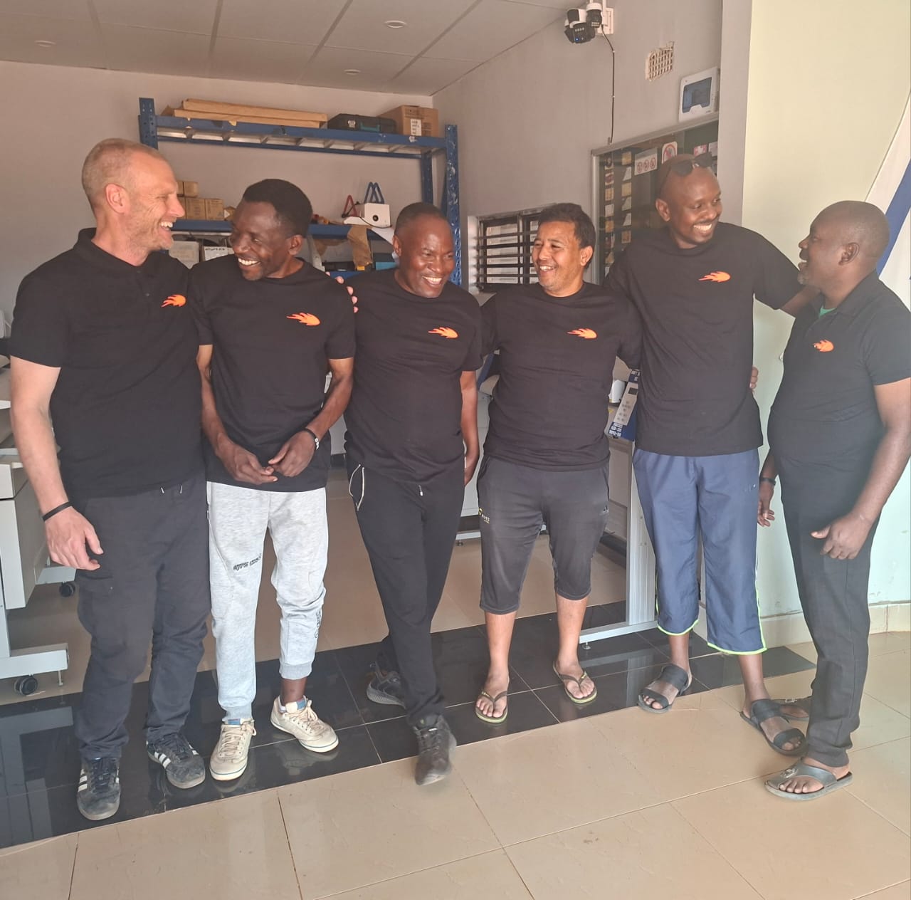 Christopher Lockwood standing with a team of Zambian church-planting leaders he is training